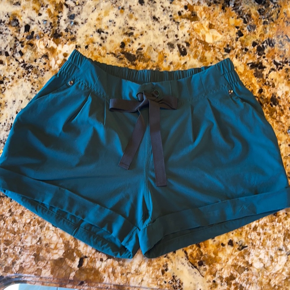 Great Condition Lululemon tie shorts in Color Teal. Size 8